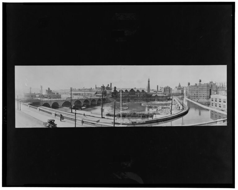 The canalized channel where the Barge Canal crosses the Genesee River at Rochester, early 20th century